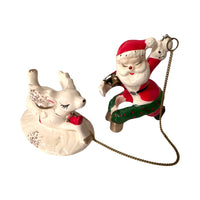 Load image into Gallery viewer, Vintage Commadore Mr. and Mrs. Santa Claus Candle Climber Set
