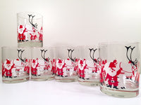 Load image into Gallery viewer, Georges Briard - Signed Mid-Century Elf and Reindeer 7-Piece Set (6 Highball Glasses and Appetizer Tray)
