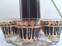 Load image into Gallery viewer, Fred Press Signed Mid-Century Black and 22-Karat Gold Diamonds Retro 8-Piece Cocktail Set (1 Pitcher, 1 Carrier, 6 Glasses)
