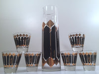Load image into Gallery viewer, Fred Press Signed Mid-Century Black and 22-Karat Gold Diamonds Retro 8-Piece Cocktail Set (1 Pitcher, 1 Carrier, 6 Glasses)
