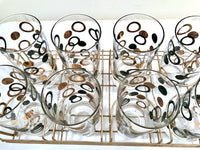 Load image into Gallery viewer, Mid-Century 22-Karat Gold and Black Circle Highball Glasses With Carrier (Set of 8)
