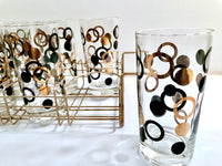 Load image into Gallery viewer, Mid-Century 22-Karat Gold and Black Circle Highball Glasses With Carrier (Set of 8)
