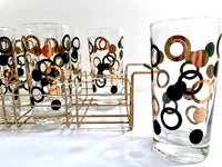 Load image into Gallery viewer, Mid-Century 22-Karat Gold and Black Circle Highball Glasses With Carrier (Set of 8)
