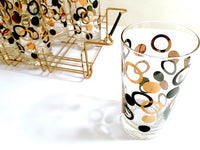 Load image into Gallery viewer, Mid-Century 22-Karat Gold and Black Circle Highball Glasses With Carrier (Set of 8)
