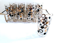 Load image into Gallery viewer, Mid-Century 22-Karat Gold and Black Circle Highball Glasses With Carrier (Set of 8)
