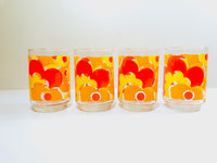 Load image into Gallery viewer, Libbey Mid-Century Orange &amp; Yellow Flower Power Glasses (Set of 4)
