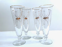 Load image into Gallery viewer, Libbey Mid-Century Adagio Pilsner Glasses (Set of 4)
