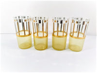 Load image into Gallery viewer, Georges Briard Signed Gold and White Glasses with Rubberized Bottoms (Set of 4)
